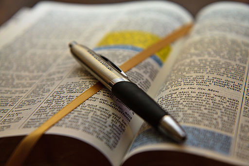 Bible with pen
